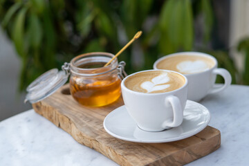 cup of tea with cinnamon sticks coffee latte