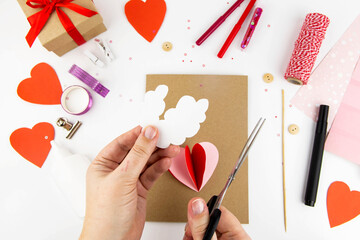Valentine's Day. Instructions for making cards for Valentine's Day. Step 4 Cut out two clouds from white paper.