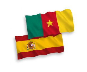 National vector fabric wave flags of Cameroon and Spain isolated on white background. 1 to 2 proportion.