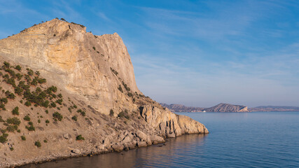 Fototapeta na wymiar Landscape view on mountains and Black sea in Crimea, Sudak with colorful sky