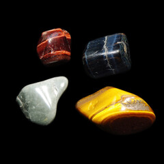 tiger's eye, bull's eye, falcon's eye, cat's eye on black background 