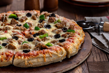 Sausage Pizza With Black Olives and Peppers