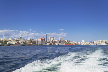 Fototapeta na wymiar view from sea on Vladivostok on sunny day