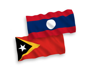 National vector fabric wave flags of East Timor and Laos isolated on white background. 1 to 2 proportion.