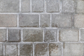 Paving slabs covered with ice. Place for text