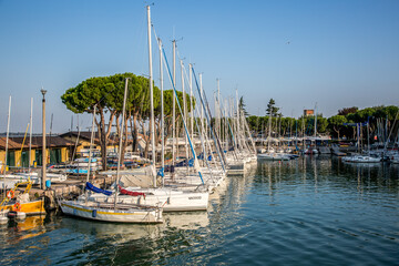 Fototapeta na wymiar Yacht parking, marina in Desenzano del Garda. Lombardy, Italy.