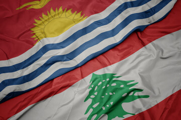 waving colorful flag of lebanon and national flag of Kiribati .