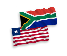 Obraz premium National vector fabric wave flags of Liberia and Republic of South Africa isolated on white background. 1 to 2 proportion.