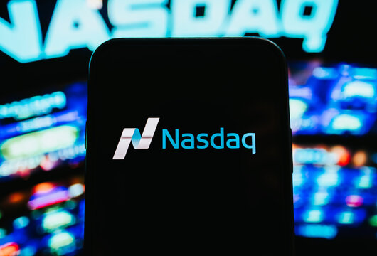 Nasdaq logo on mobile phone screen. Nasdaq is an American stock exchange.