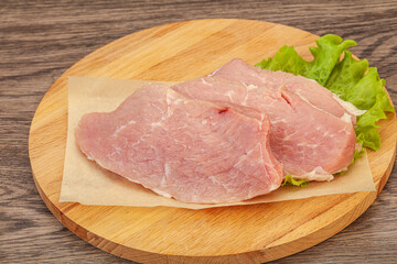 Raw pork steak for cooking