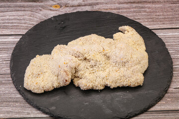 Raw meat schnitzel for roast
