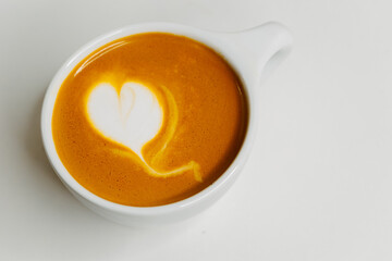 a cup of coffee on the table espresso