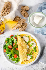 Bio eggs omelet with salad