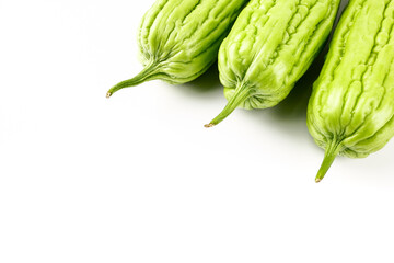 Momordica charantia balsam apple, balsam pear, bitter cucumber, bitter gourd, bitter melon tropical herb isolated on white background.Health and medical concept