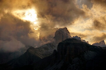 Dramatic cloudy sunset in the mountains - Dolomites, Italy, Europe 