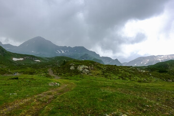 rains clouds in the mountains while hiking