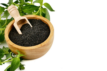 Lemon basil seeds in wooden spoon isolated on white background.food for help Reduce Cholesterol Levels For those who need to control weight
