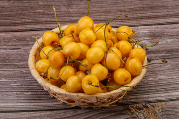 Sweet ripe yellow cherry heap