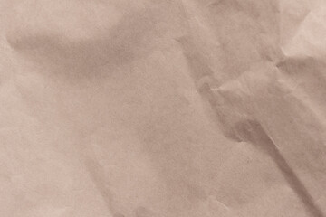 Naklejka premium Texture of crumpled light brown craft paper.