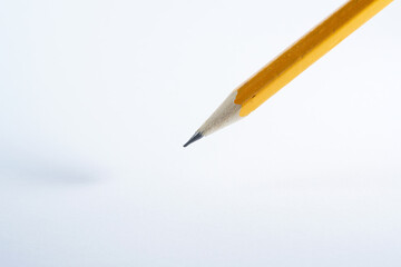Sharp pencil in the light backgroundons