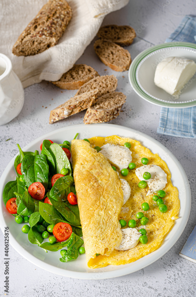 Wall mural bio eggs omelet with salad