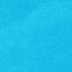 Cardboard blue abstract pattern texture close-up. Retro old paper background. Grunge concrete wall. Vintage blank wallpaper.