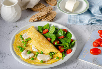 Bio eggs omelet with salad