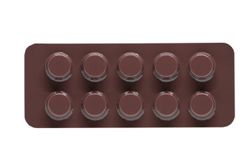 Closed up brown blister pack of medicine on white
