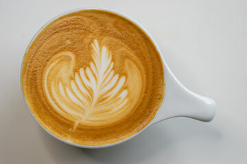 cup of tea and coffee next to plants