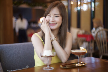 Asian girl have a breakfast in coffee shop