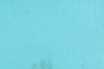 Cardboard blue abstract pattern texture close-up. Retro old paper background. Grunge concrete wall. Vintage blank wallpaper.