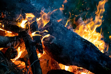 Close up detail of the flames of burning campfire