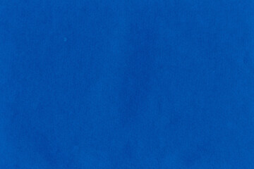 Cardboard blue abstract pattern texture close-up. Retro old paper background. Grunge concrete wall. Vintage blank wallpaper.