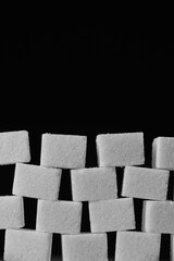 White sugar in the form of cubes.