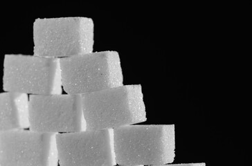 White sugar in the form of cubes.