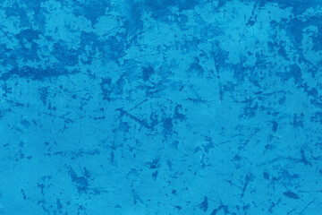 Cardboard blue abstract pattern texture close-up. Retro old paper background. Grunge concrete wall. Vintage blank wallpaper.