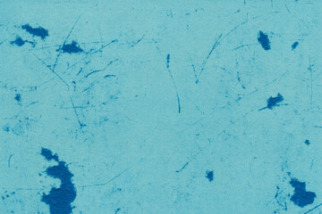 Cardboard blue abstract pattern texture close-up. Retro old paper background. Grunge concrete wall. Vintage blank wallpaper.