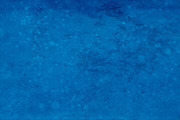 Cardboard blue abstract pattern texture close-up. Retro old paper background. Grunge concrete wall. Vintage blank wallpaper.