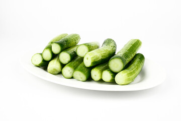 Fresh cucumber, chopped cucumber, salad ingredient,isolated on white background.