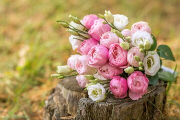 pink wedding bouquet with peonies and roses