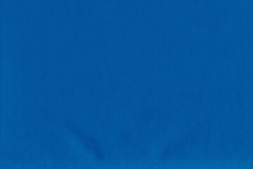 Cardboard blue abstract pattern texture close-up. Retro old paper background. Grunge concrete wall. Vintage blank wallpaper.