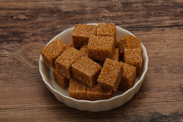 Cane sugar cubs in the bowl