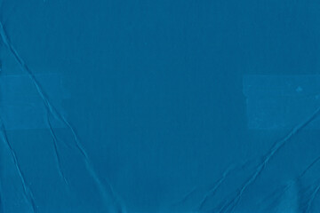 Cardboard blue abstract pattern texture close-up. Retro old paper background. Grunge concrete wall. Vintage blank wallpaper.