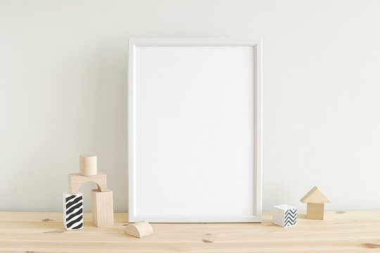 Nursery Vertical Frame Mockup, Kids Room Empty Framed Poster, Wooden Toys On Shelf, Neutral Minimal Interior.