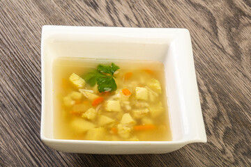 Tasty chicken soup with carrot
