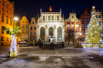 The Artus Court and fountain of the Neptune  with christmas tree, Gdansk. Poland