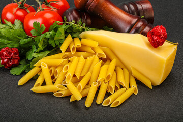Raw penne rigate for cooking