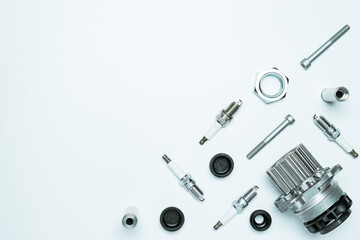 Car service. Auto motor mechanic spare or automotive piece on white background. Set of new metal car part. Repair and vehicle service with space for text.