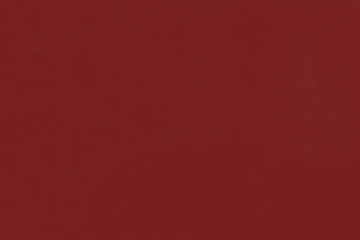 Clean red retro paper background. Vintage cardboard texture. Grunge paper for drawing. Simple blank fabric pattern.