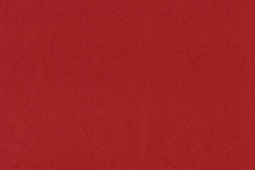 Clean red retro paper background. Vintage cardboard texture. Grunge paper for drawing. Simple blank fabric pattern.